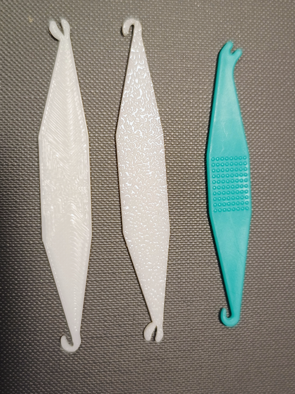 Hook for applying elastic bands