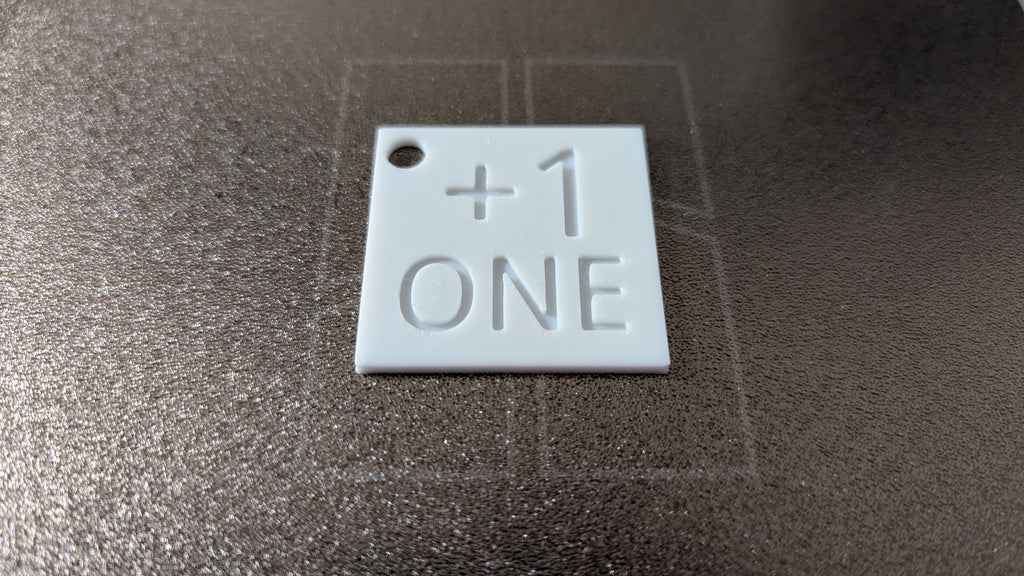 Plus One +1 Square Token With Keyring Hole