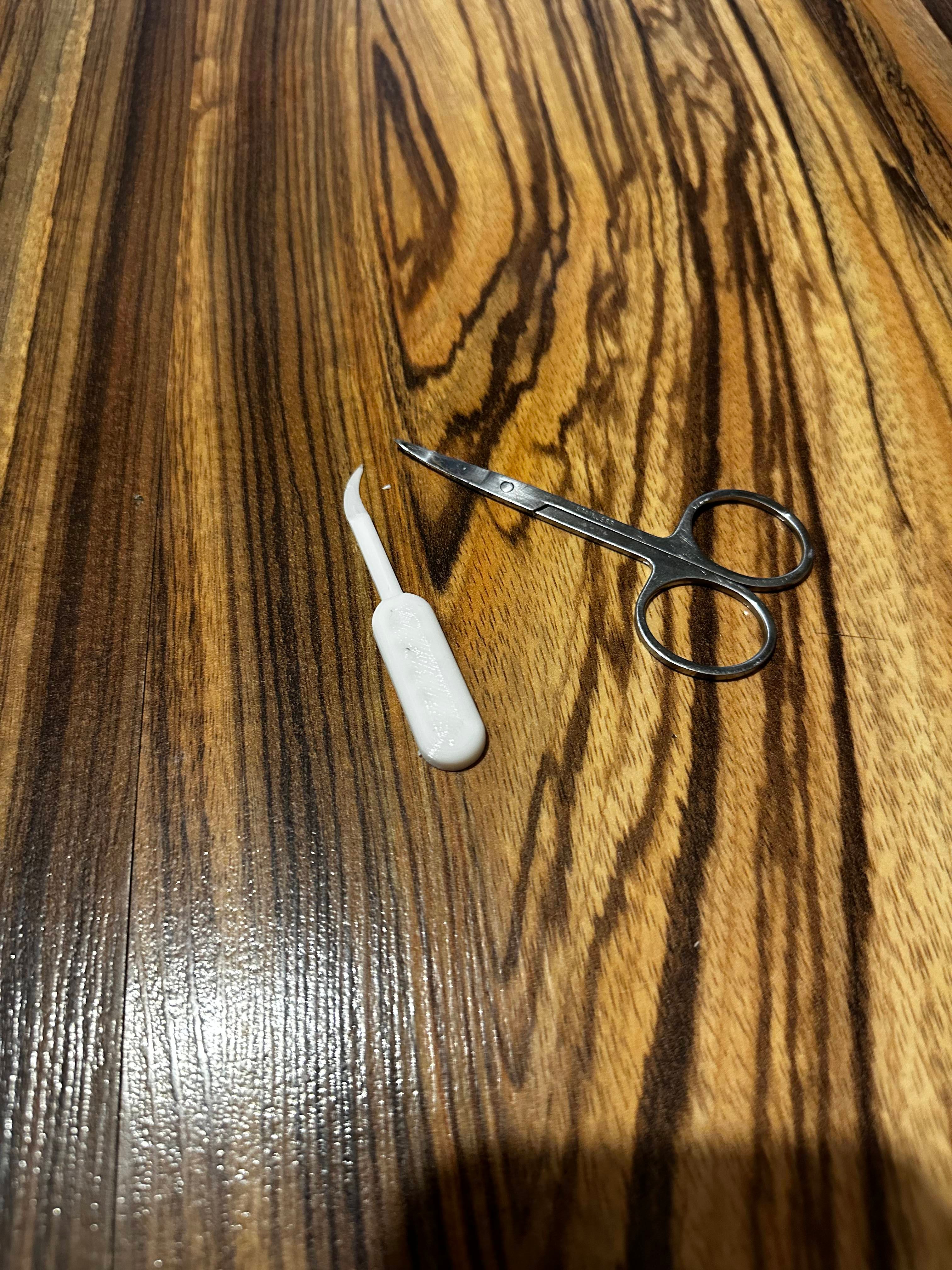 Charging port cleaning pick