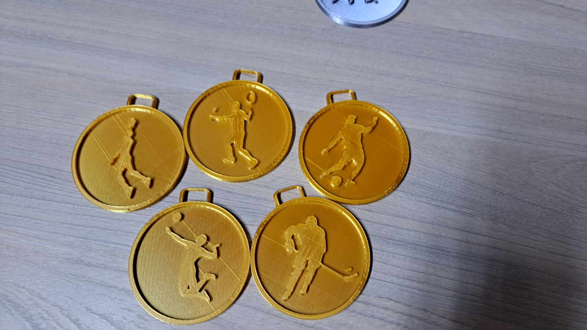 Medals set - football hockey volleyball basketball