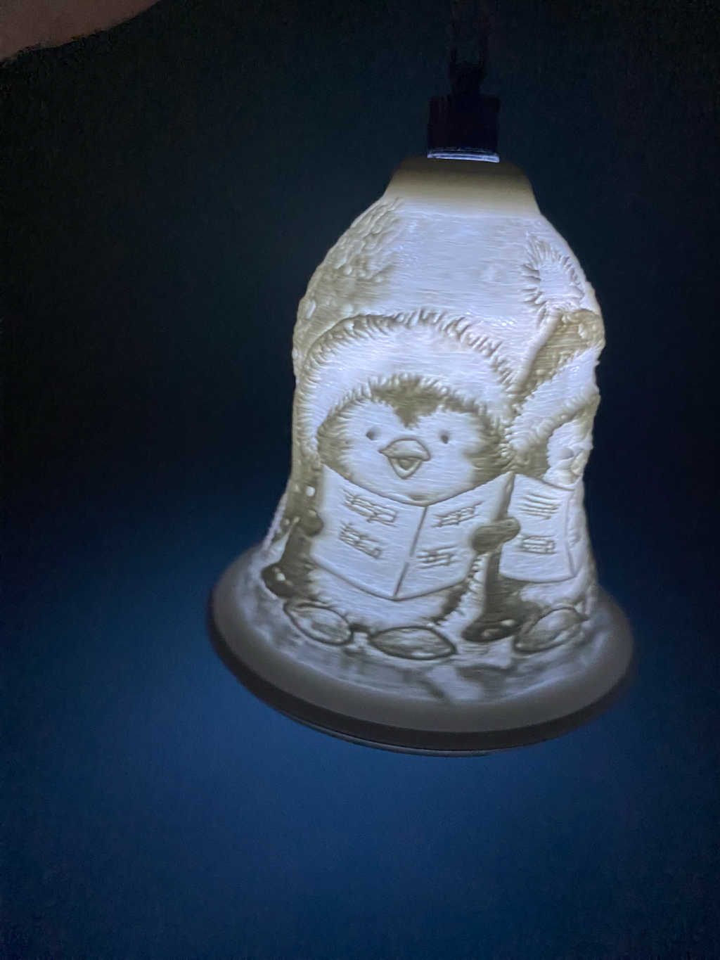 penguins singing christmas bell