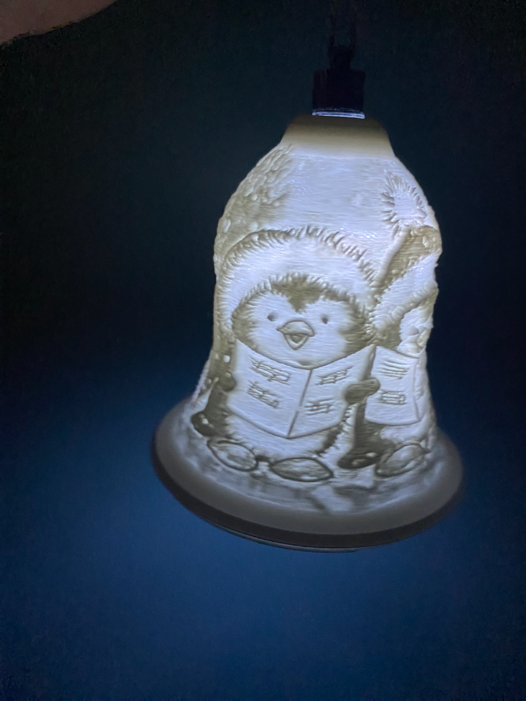 penguins singing christmas bell