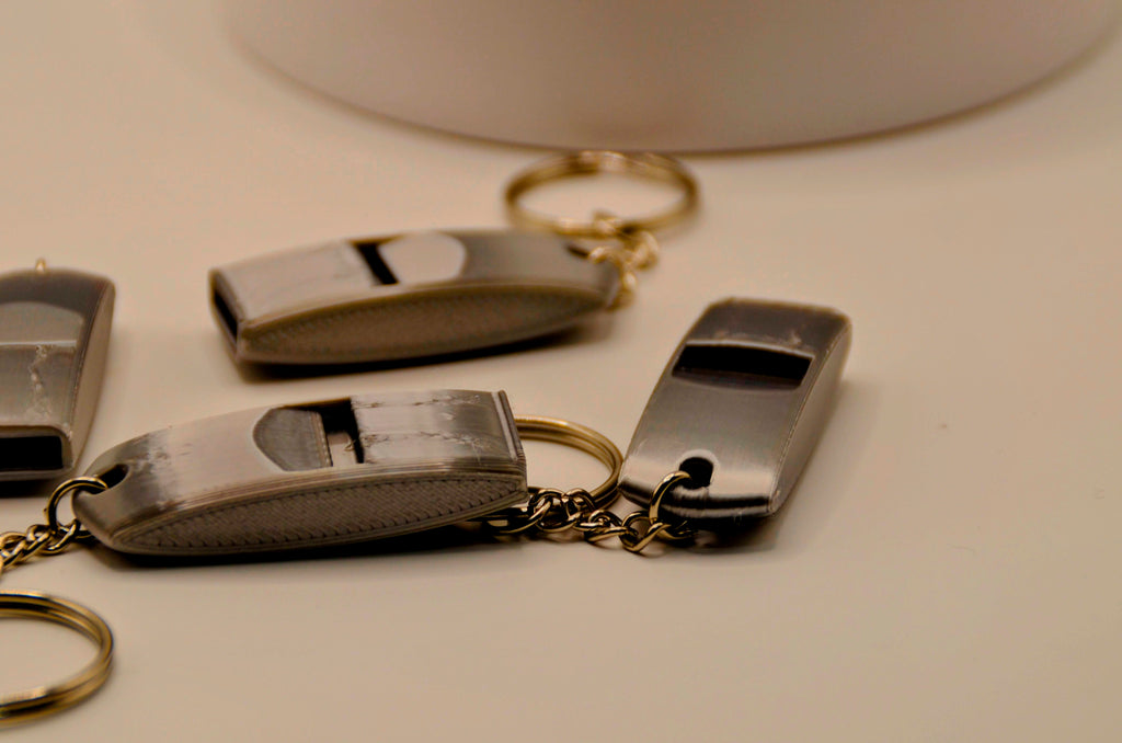 Extremely loud and compact emergency whistle
