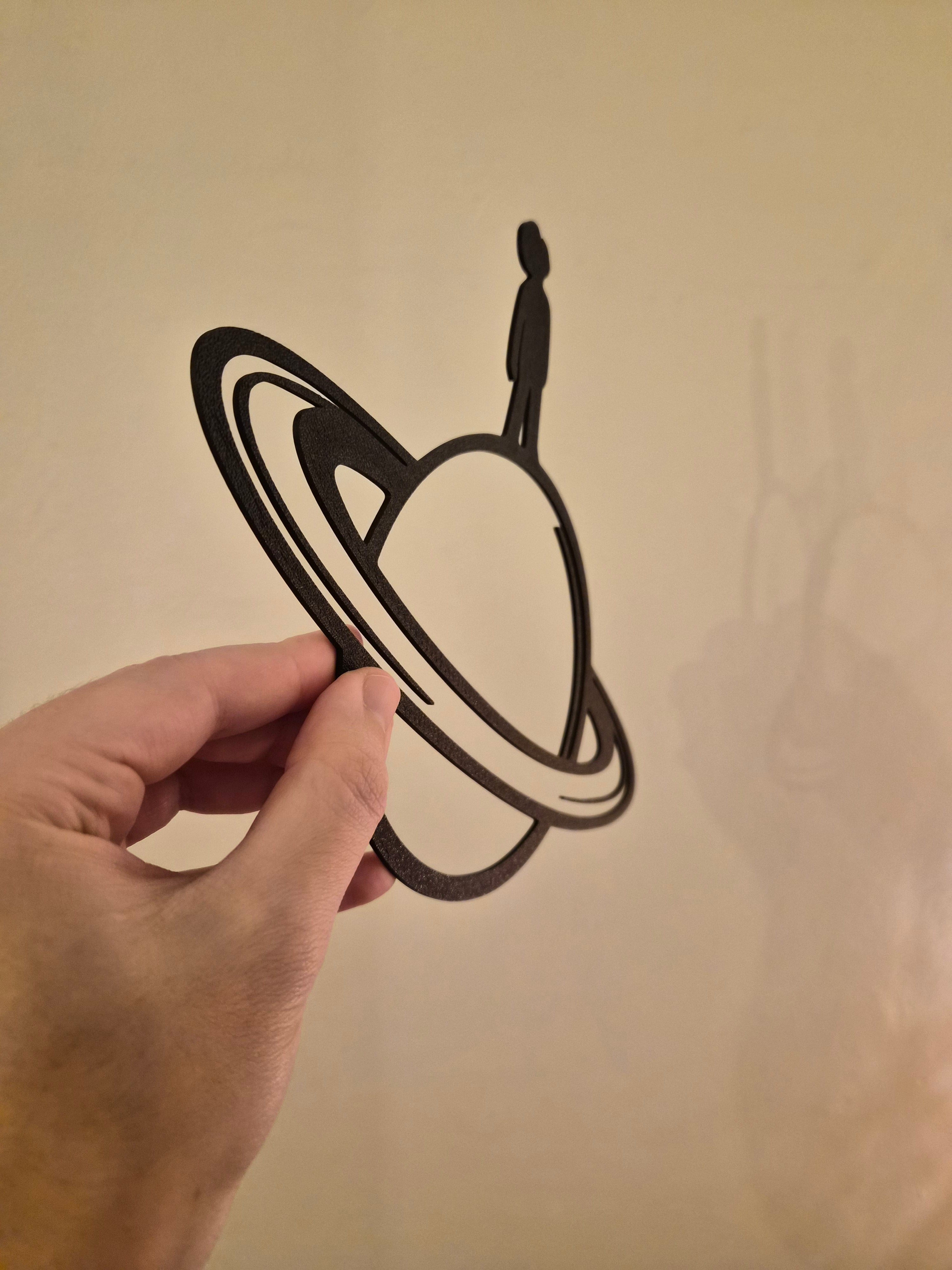 Man on Saturn Wall Art