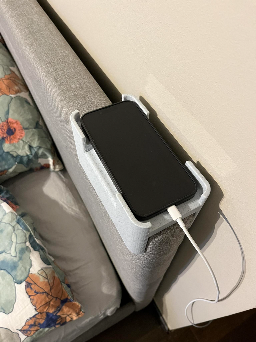 Phoner holder for a 60mm bedrest