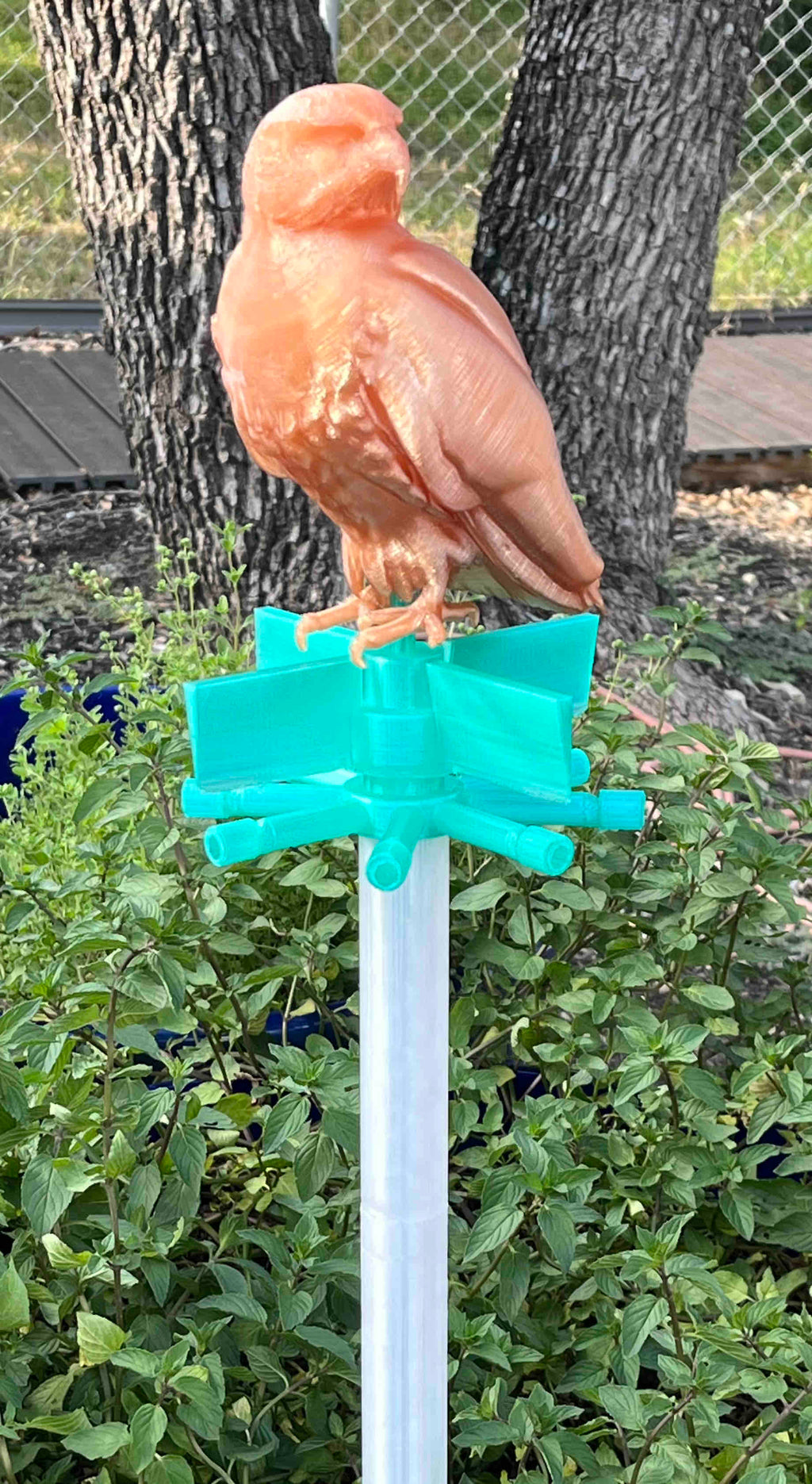 The Spinning Hawk Yard Ornament