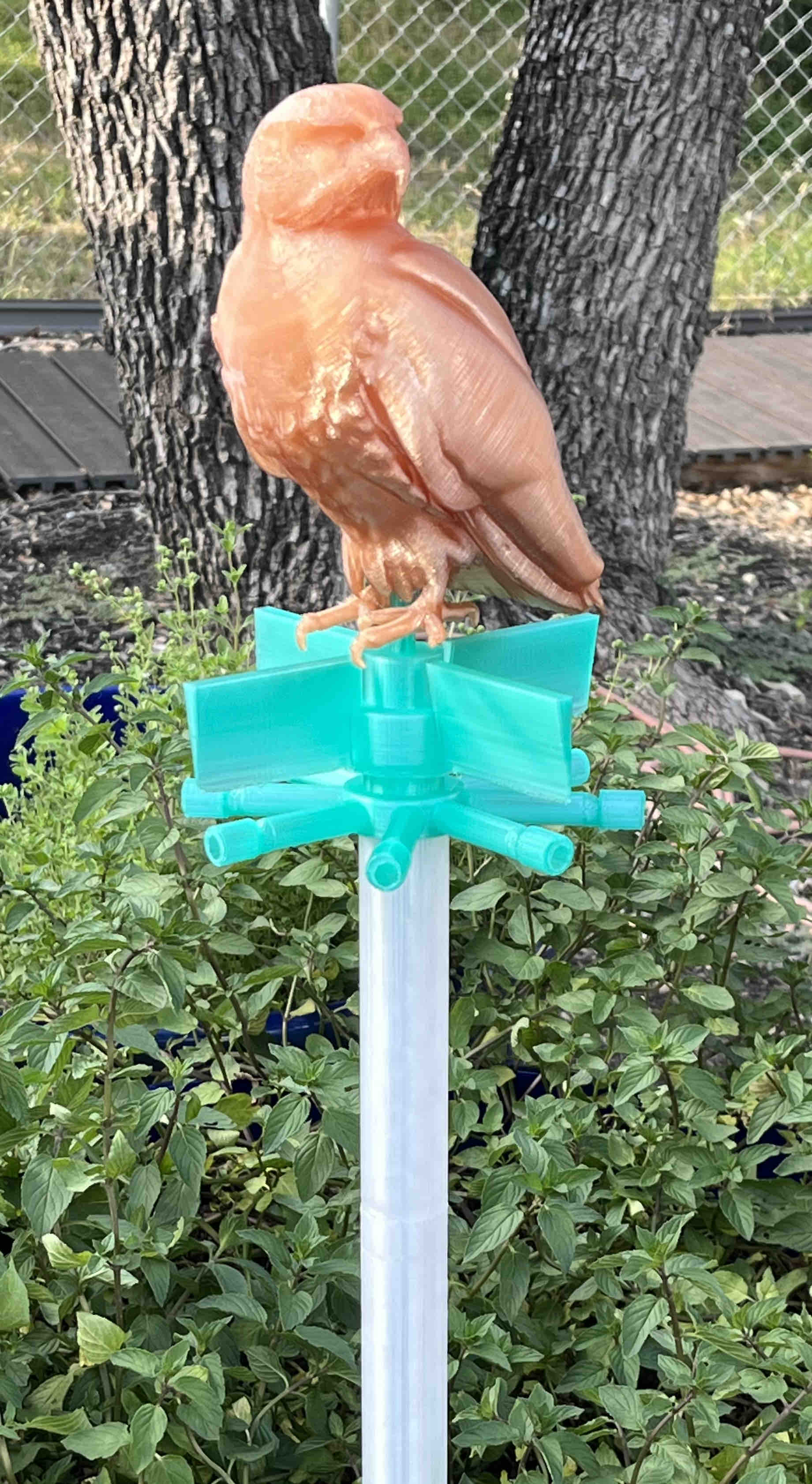 The Spinning Hawk Yard Ornament