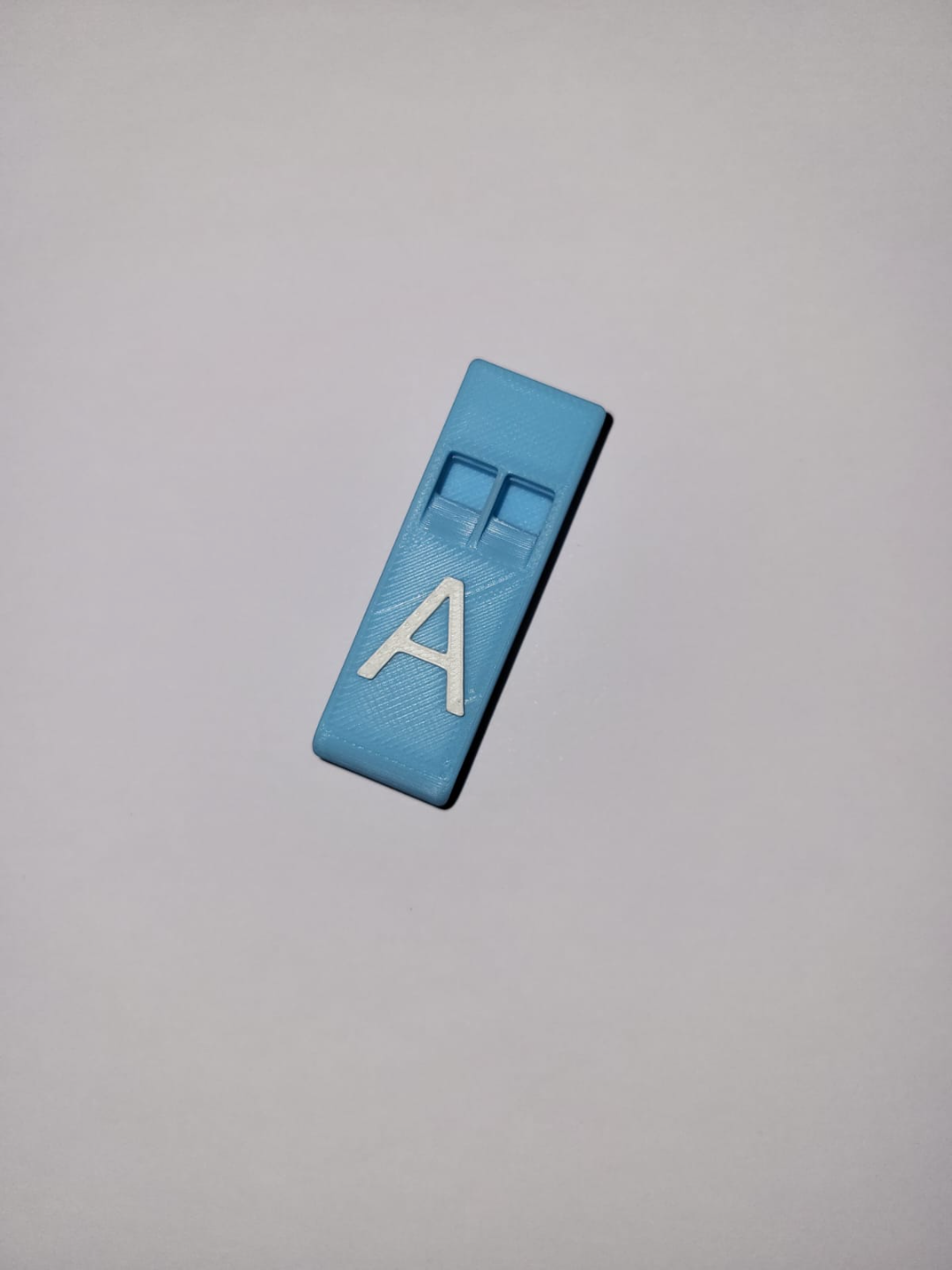 Whistle with letter A