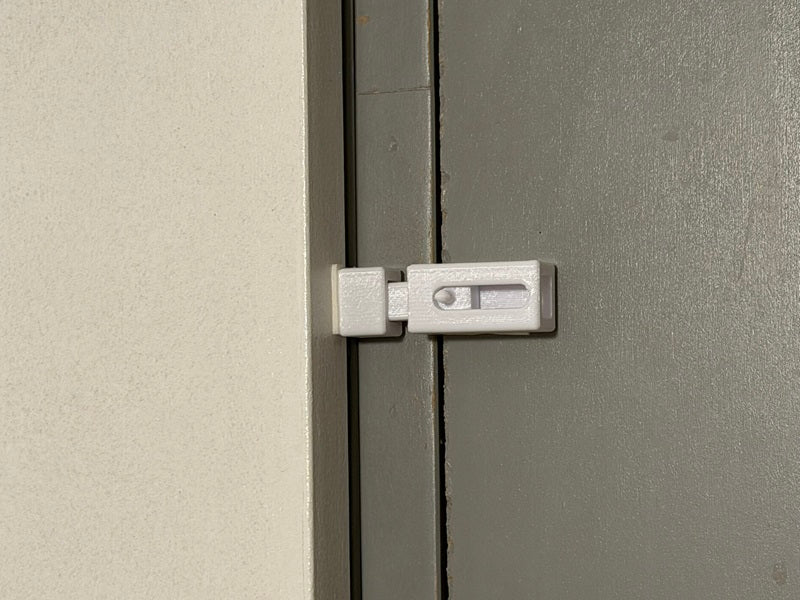 Small sliding door latch