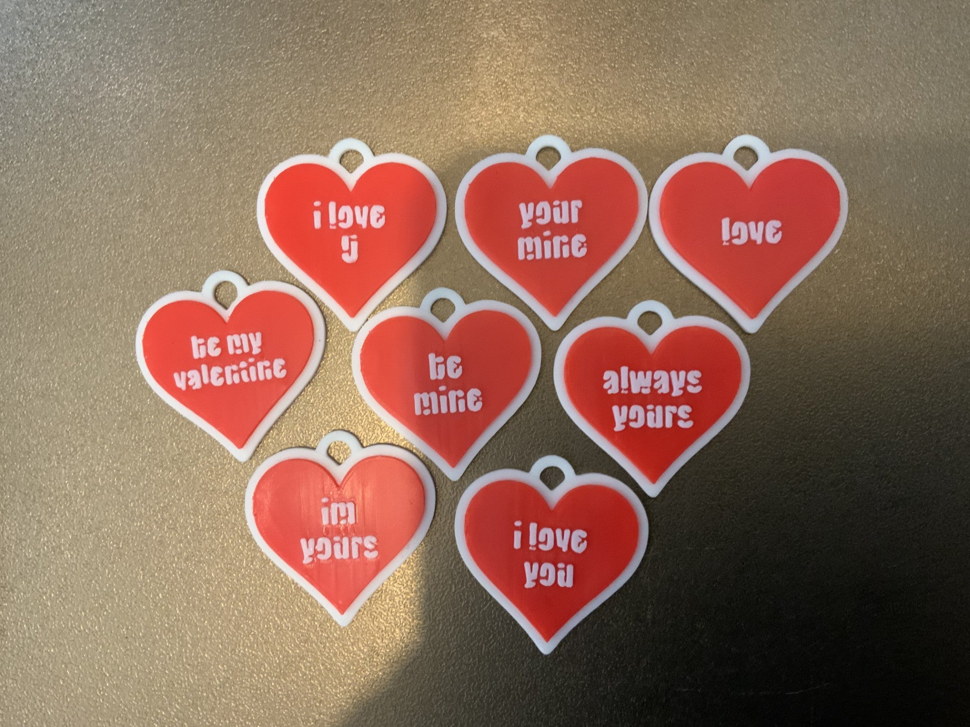 8 lovehearts with various text keychain