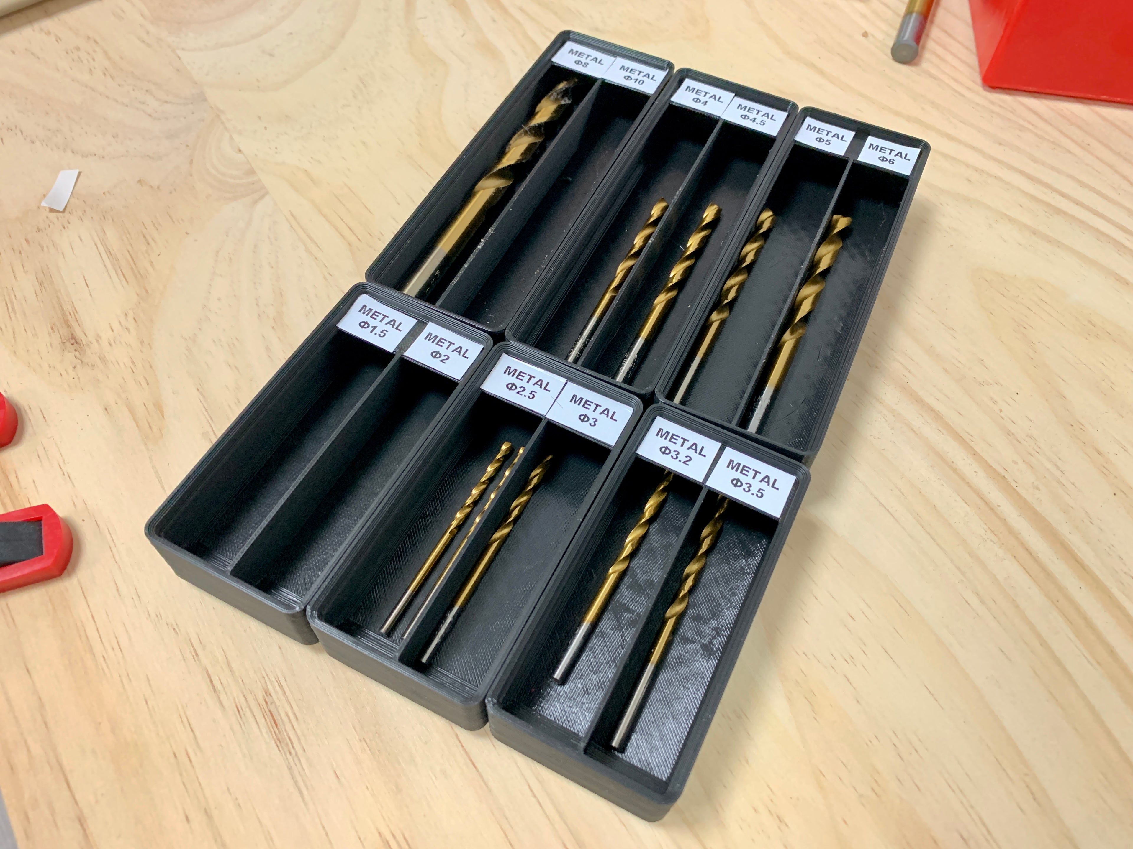 Grifinity drill bit bins