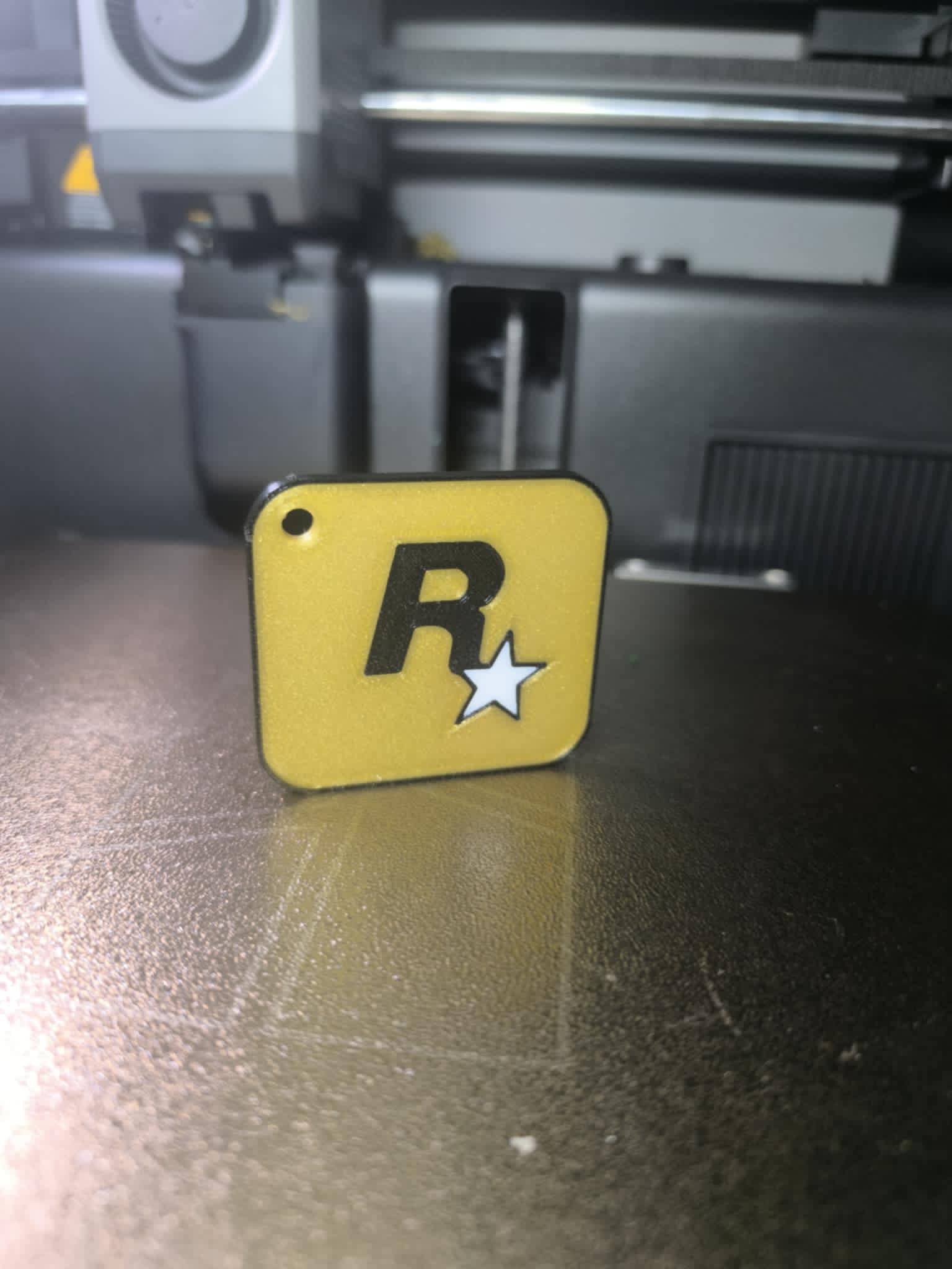 Rockstar logo keychain
