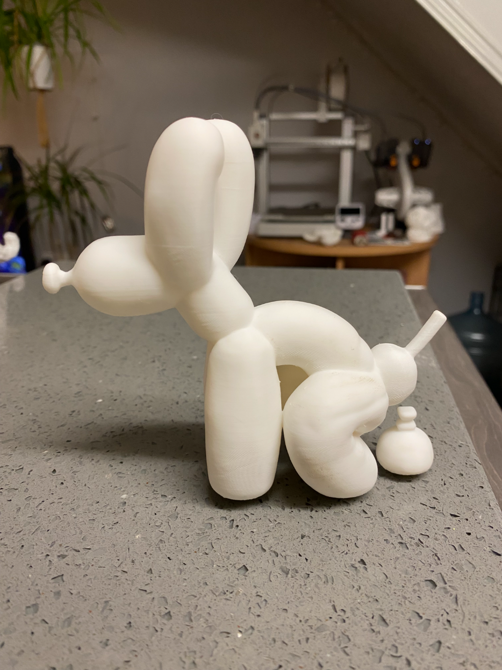 balloon dog pooping