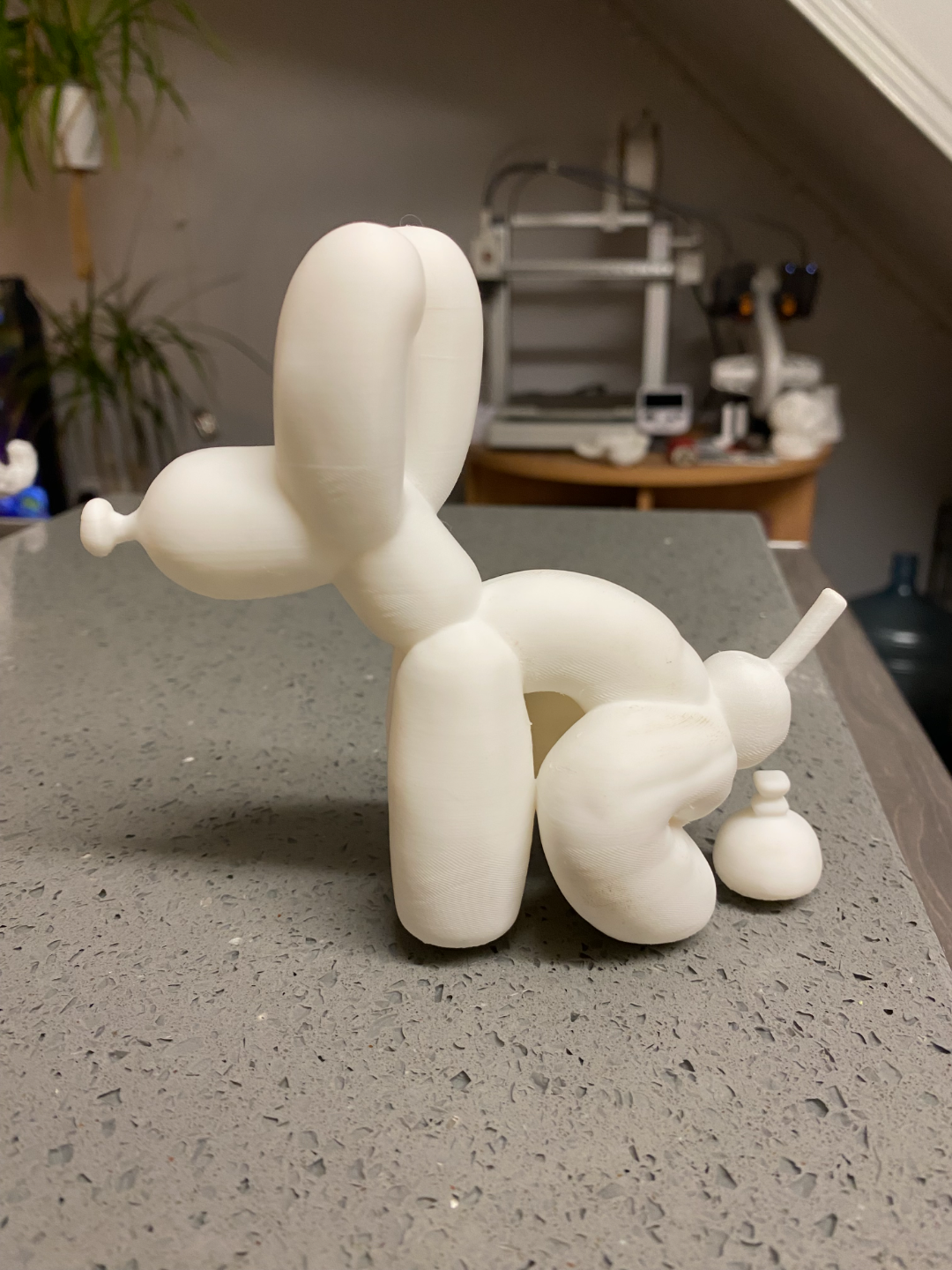 balloon dog pooping