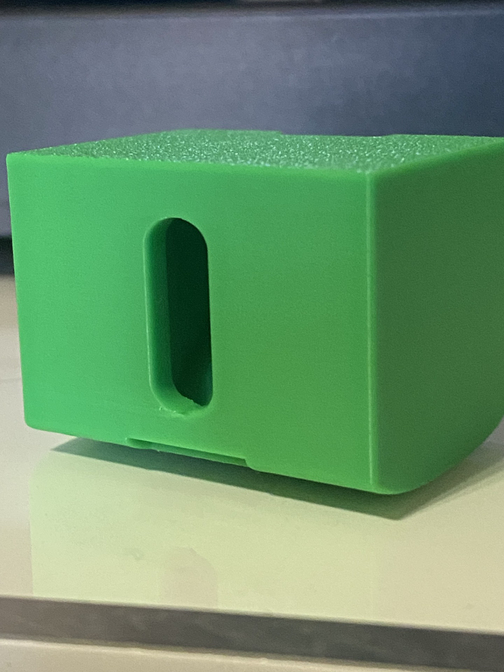 Purge filament scraper
