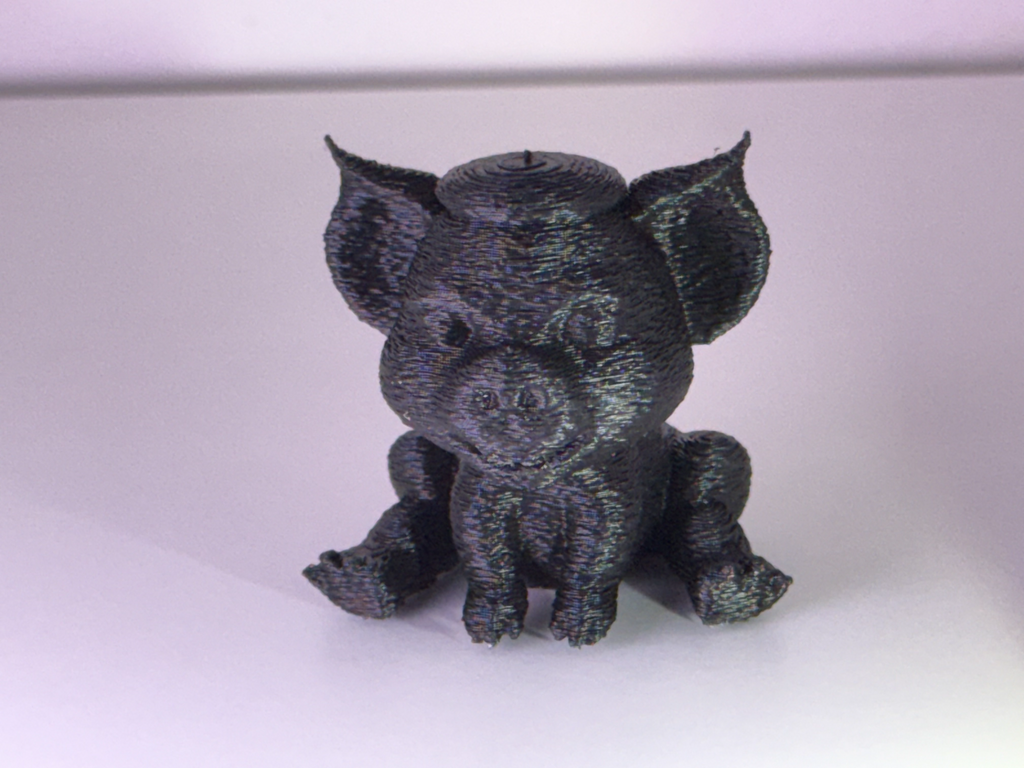 Cute knitted pig with cylinder