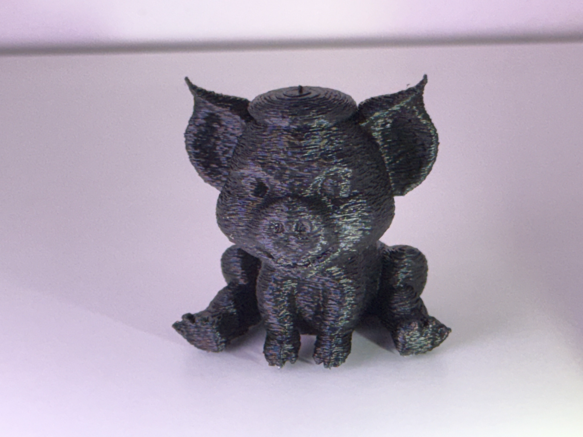 Cute knitted pig with cylinder