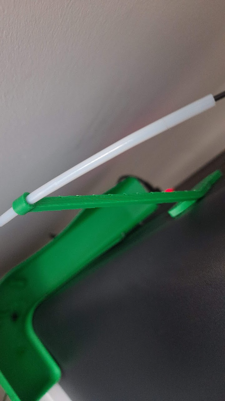Angled filament arm/guide