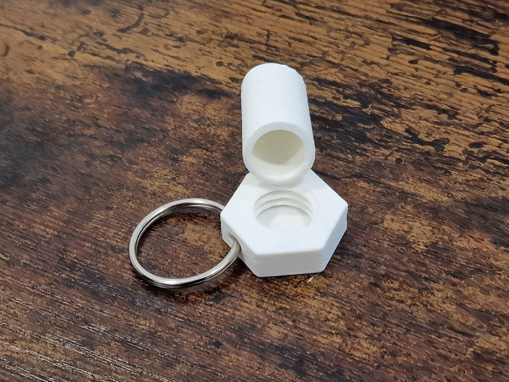 Bolt keychain with secret chamber