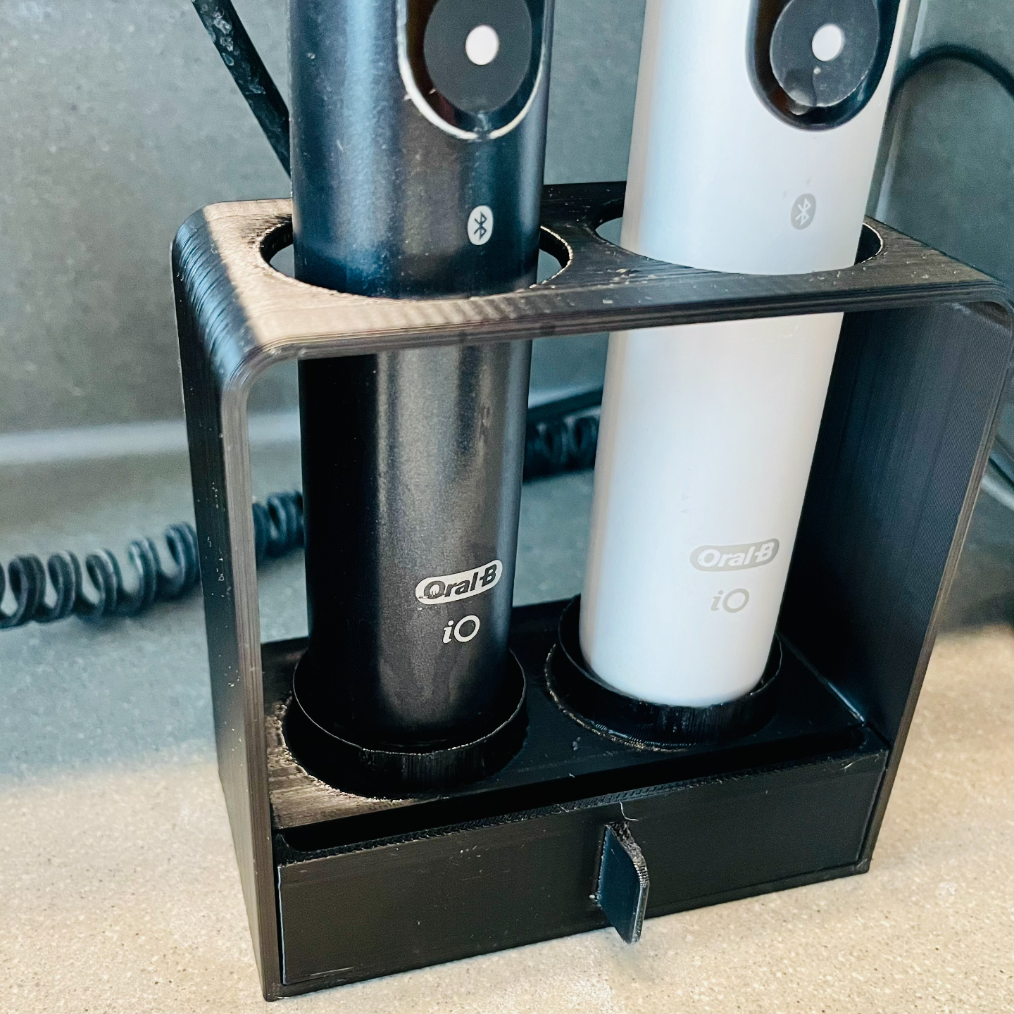 Electric toothbrush stand with drip tray