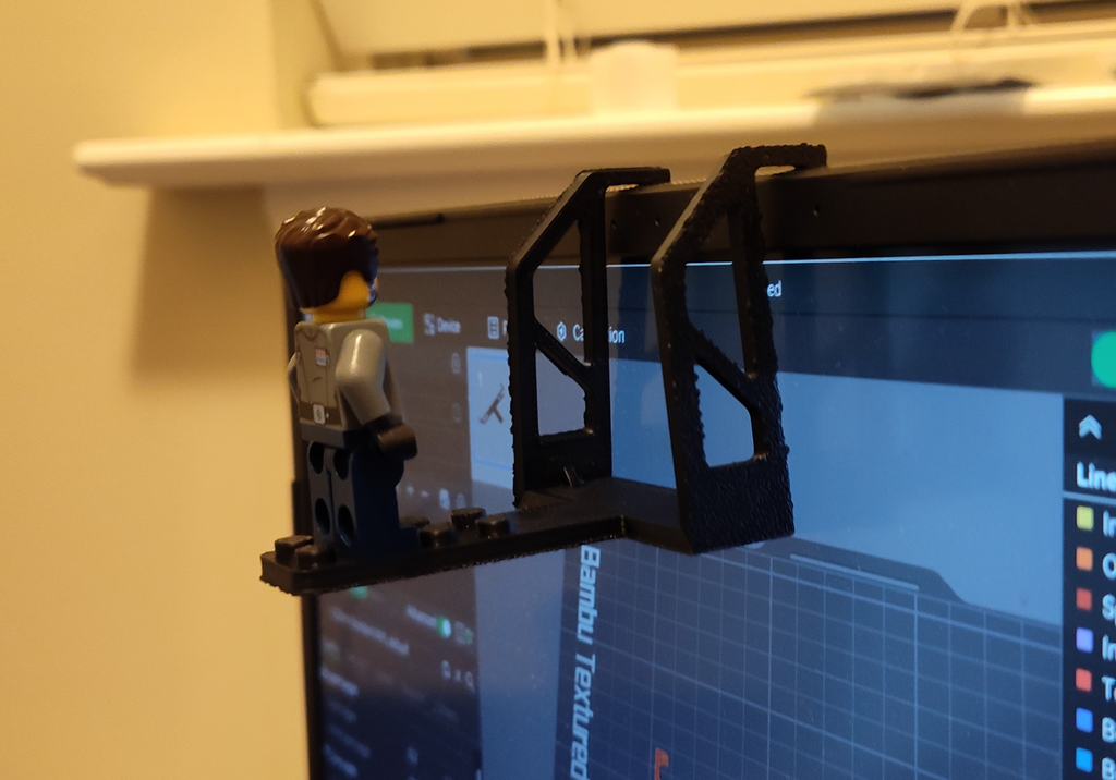 Brick person webcam hanger