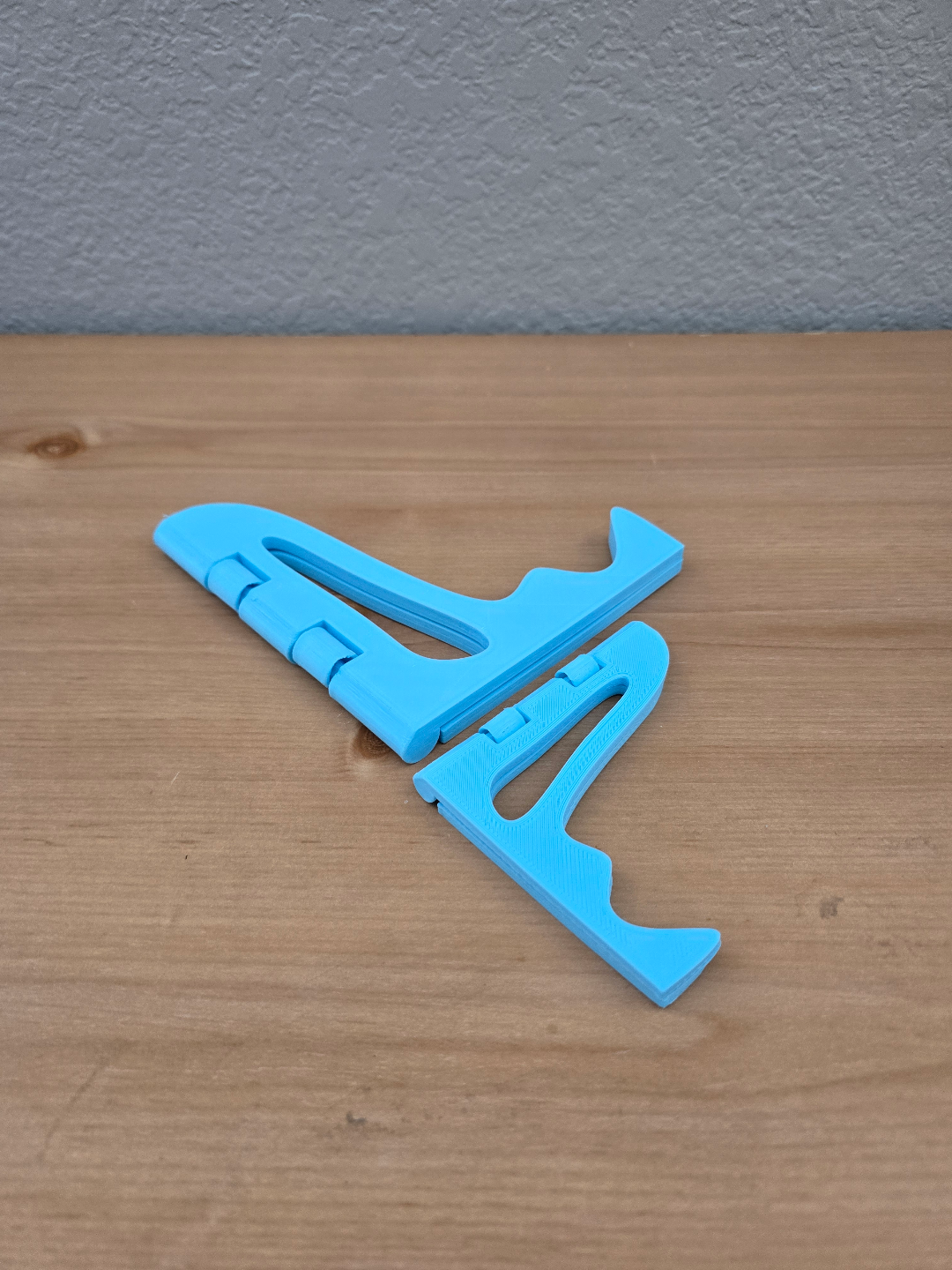 Fold out phone or picture holder