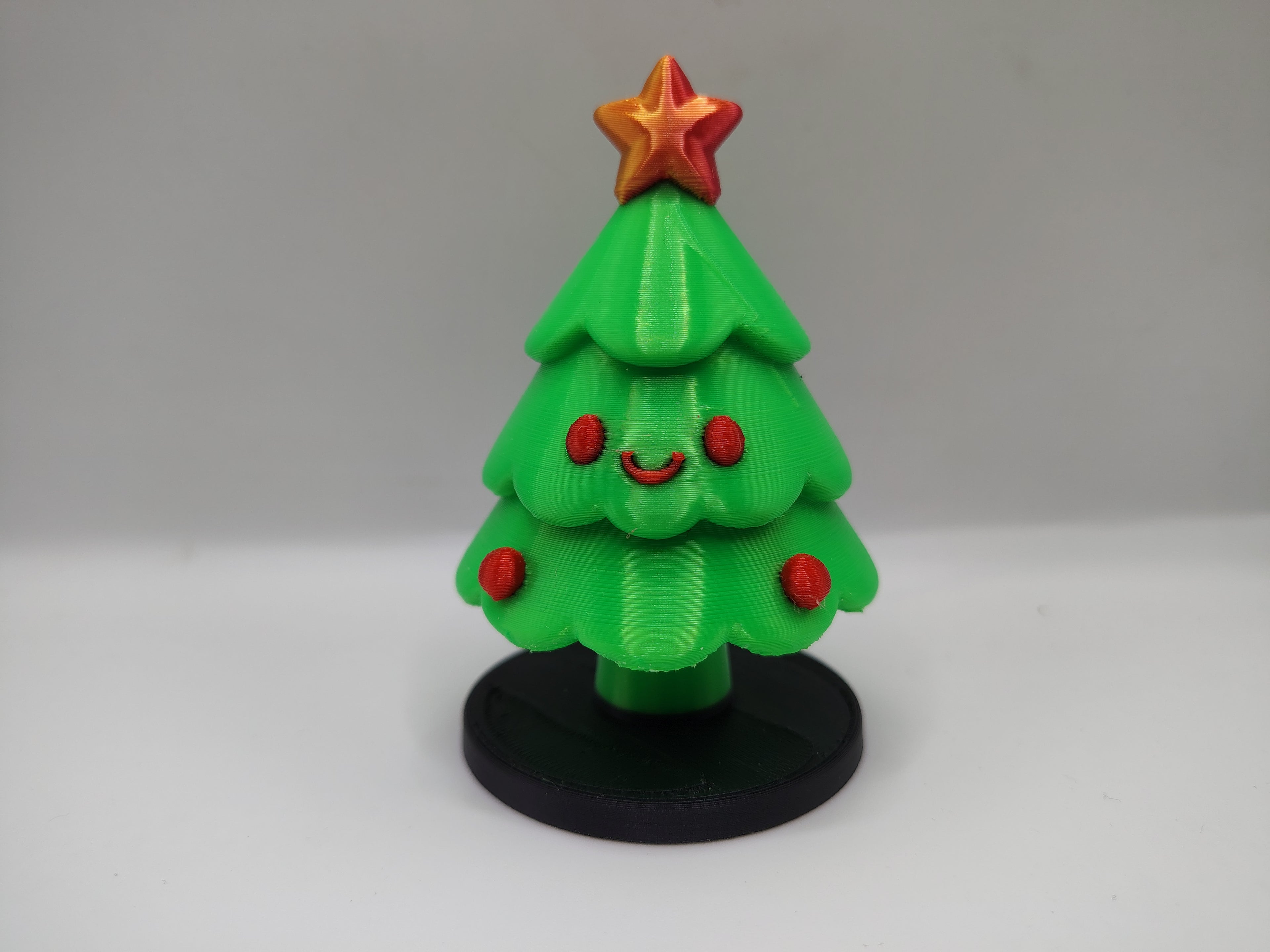 Smiling Christmas Tree with Star Topper