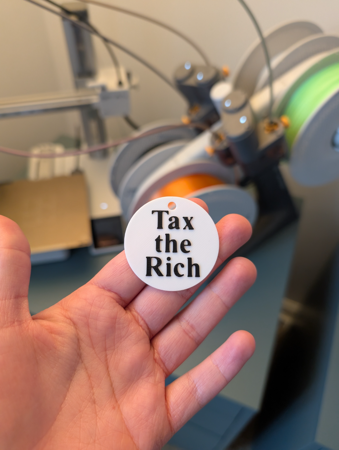 Tax the Rich Keychain in Times New Roman Font