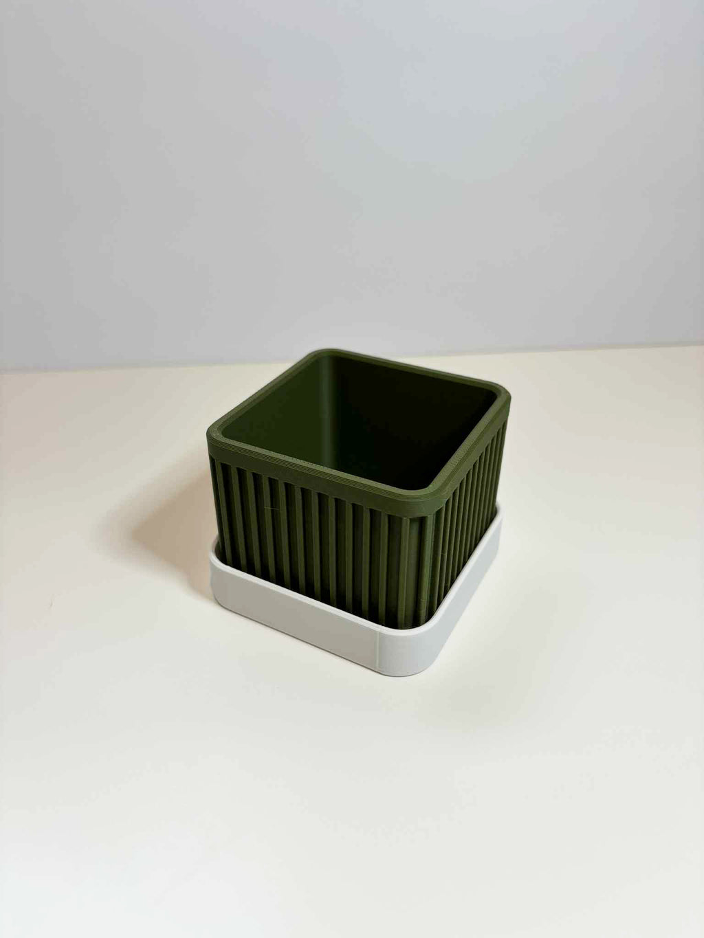 Small square ribbed planter with drip plate
