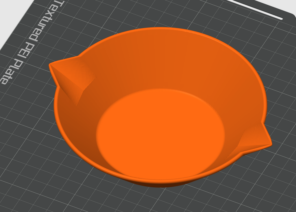 Bowl for a scale with dual pouring spout