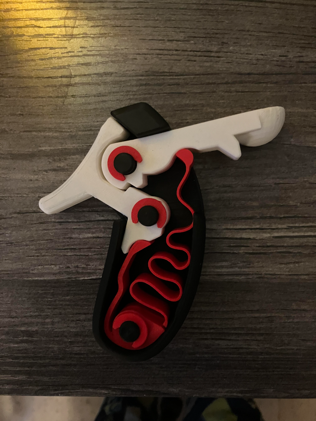 catapult attachment for cock and pull fidget toy