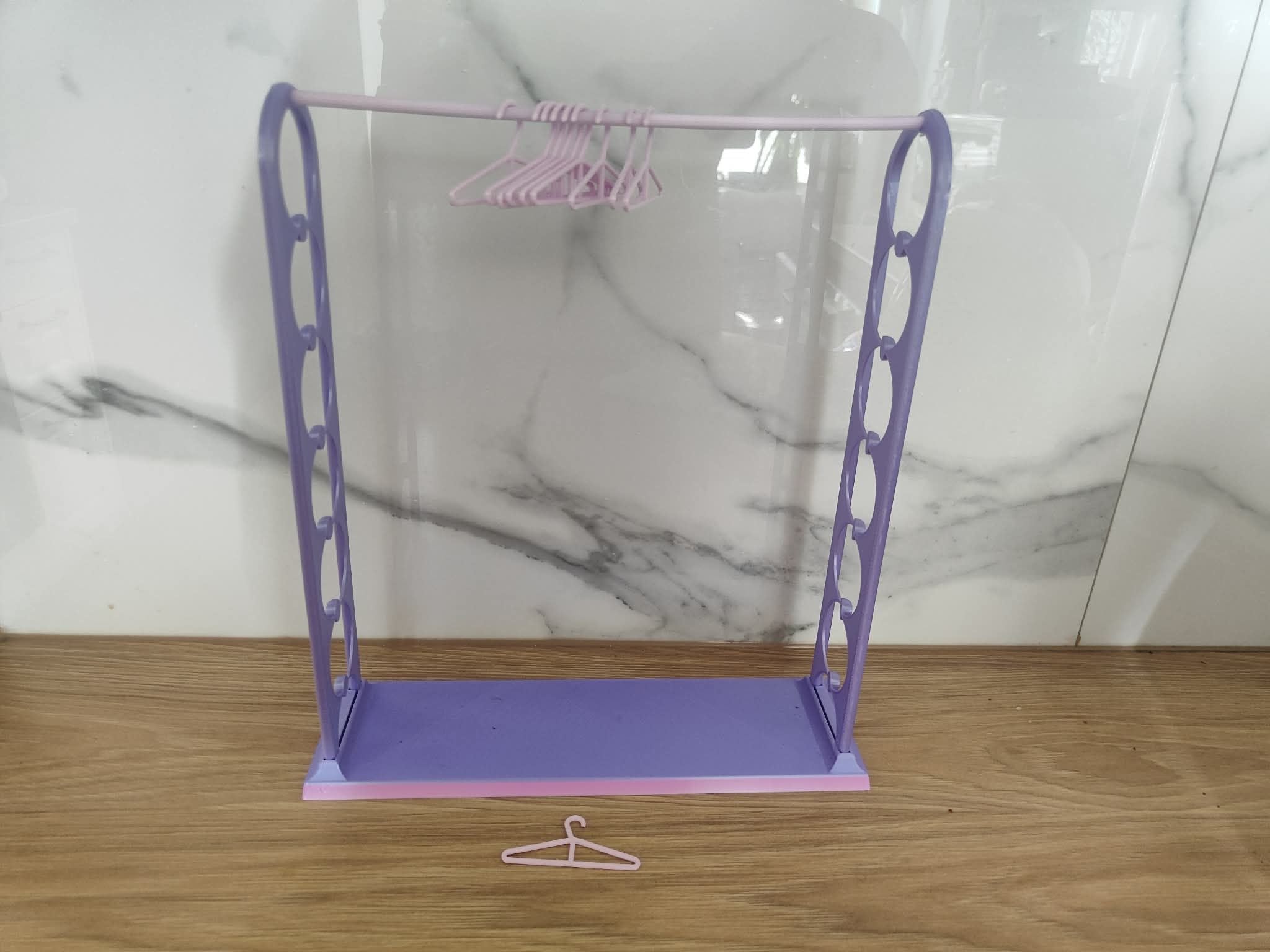 Doll clothes rack with hangers