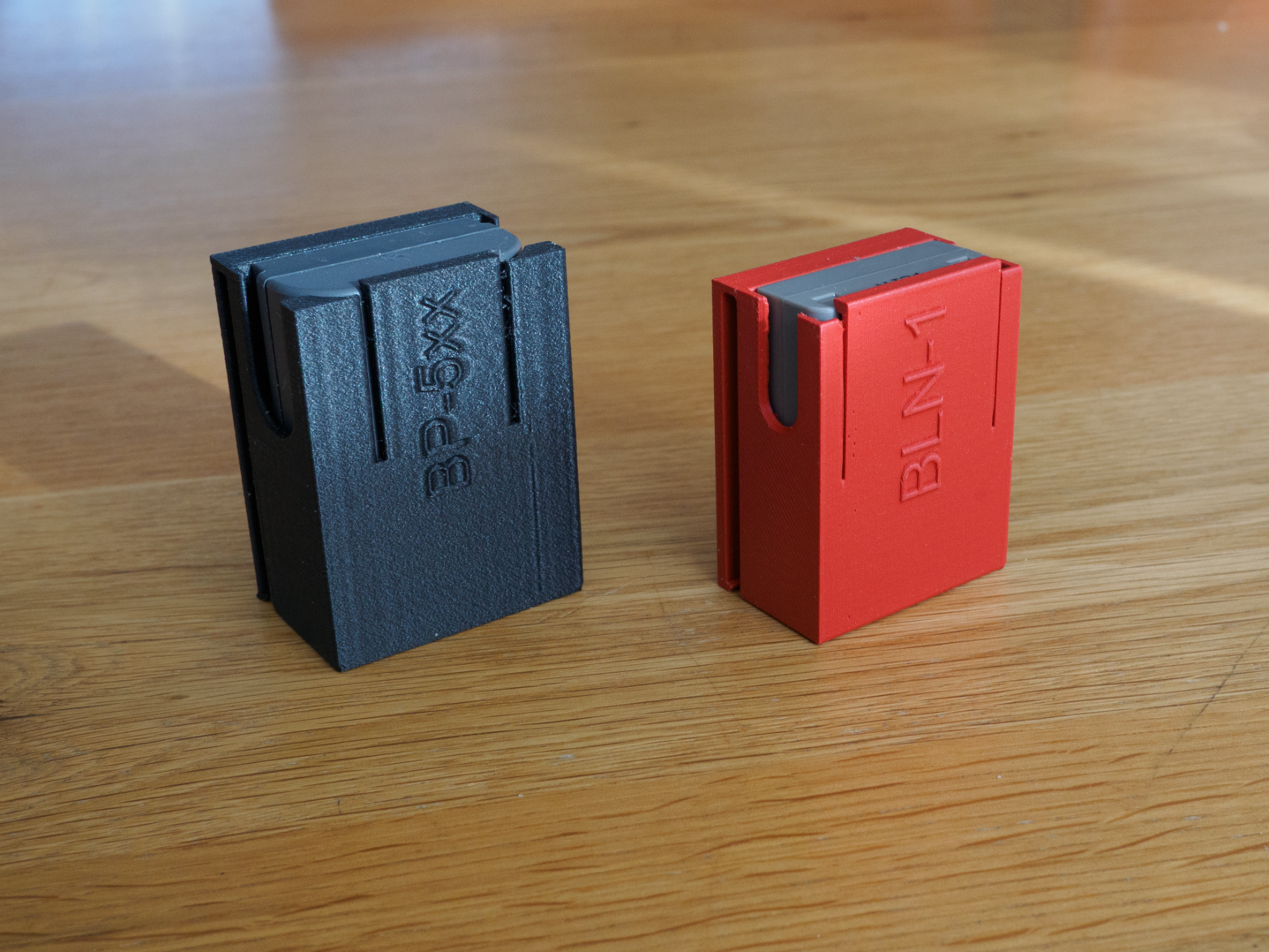 Updated belt clips for Olympus and Canon batteries