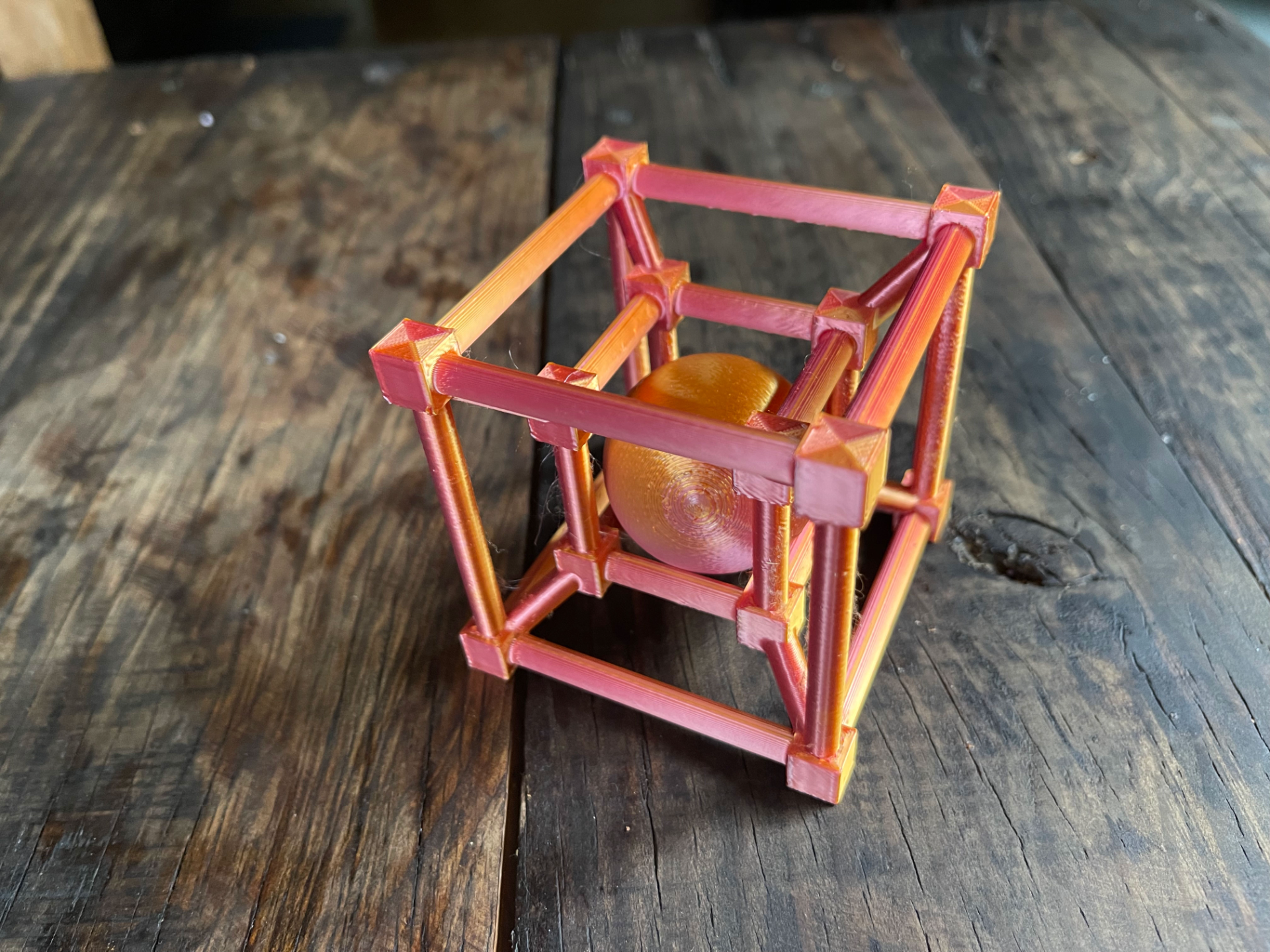 Tesseract with Sphere Entrapped