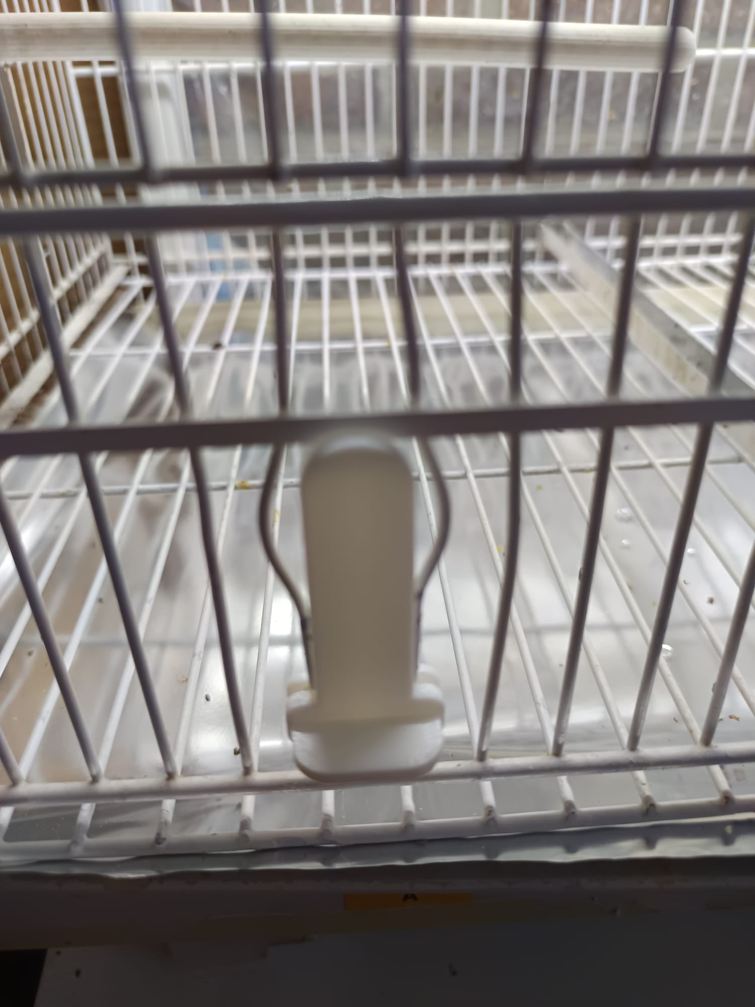 accesorio para agujeros de jaula