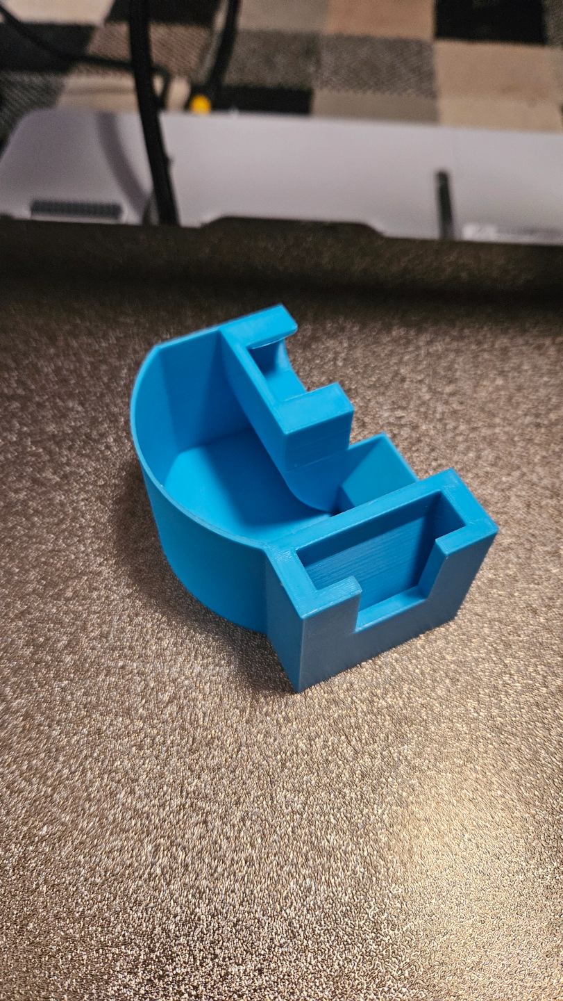 A Purge Bucket Scraper Holder