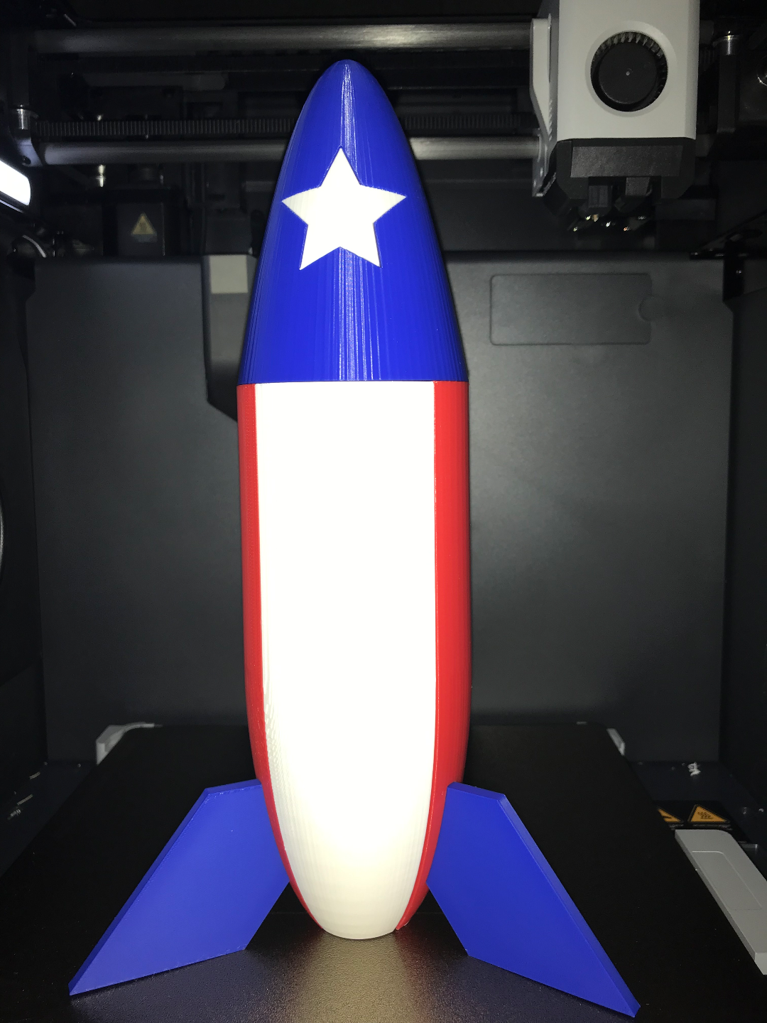 Multi color rocket with star