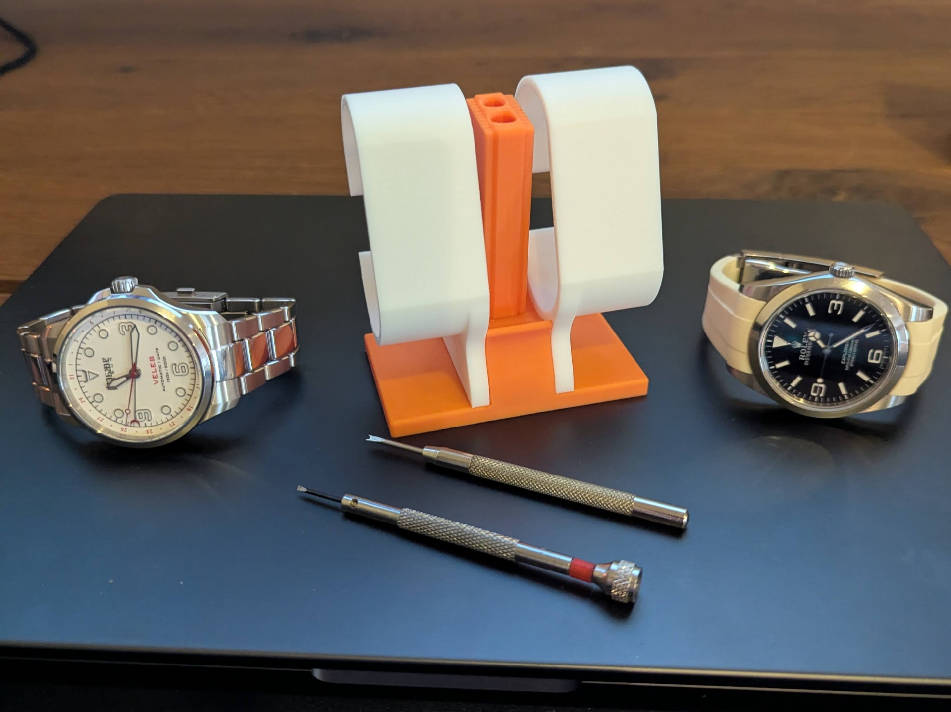 Double watch stand for smaller wrists with tools