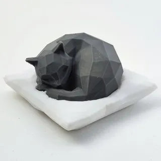 Cute low poly sleeping cat on pillow