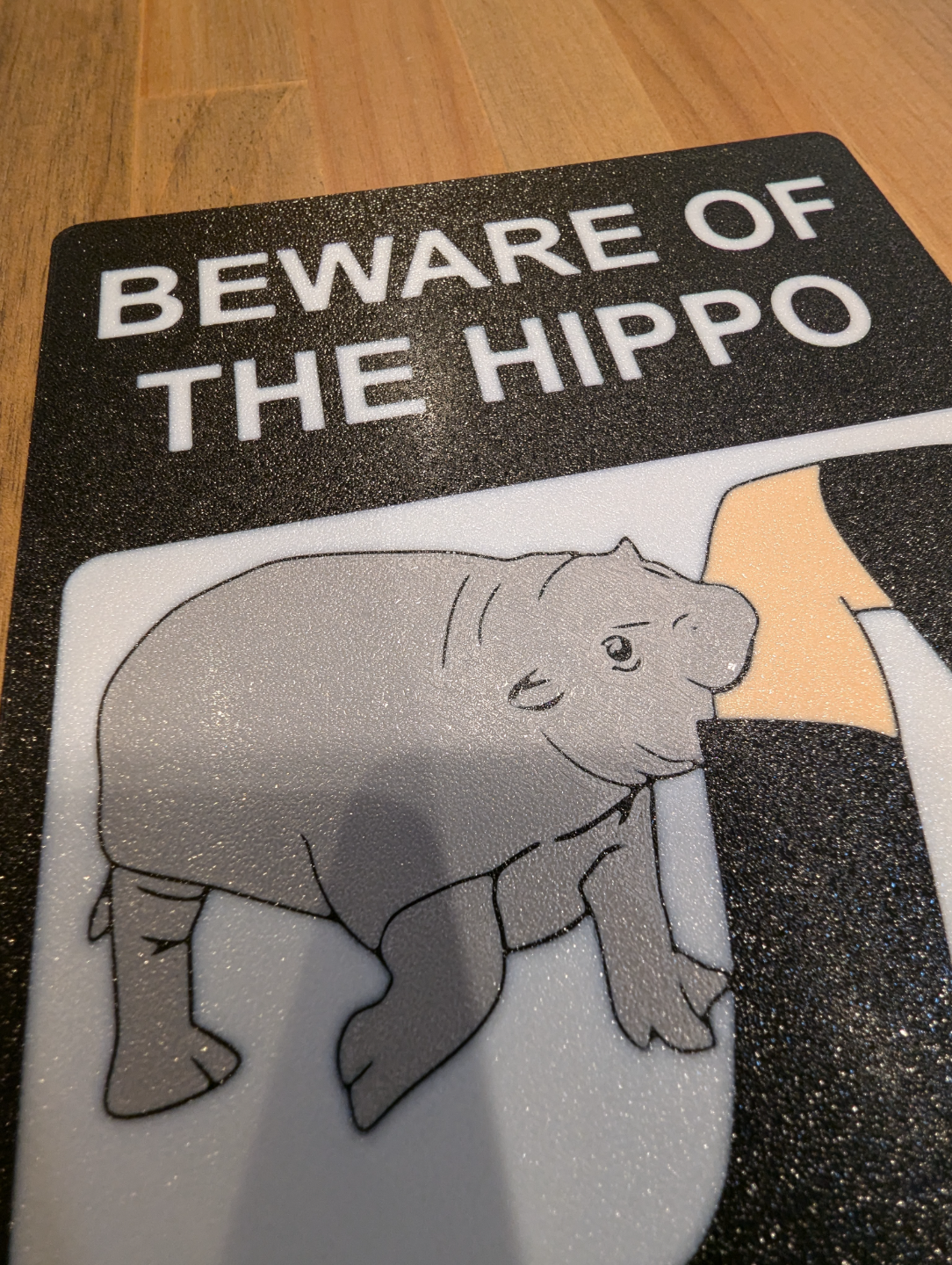 Baby hippo beware sign
