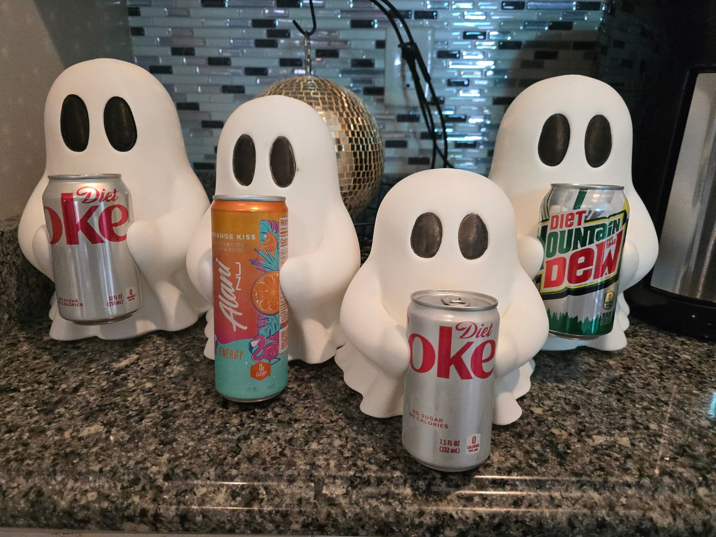 Ghosty holding soda can