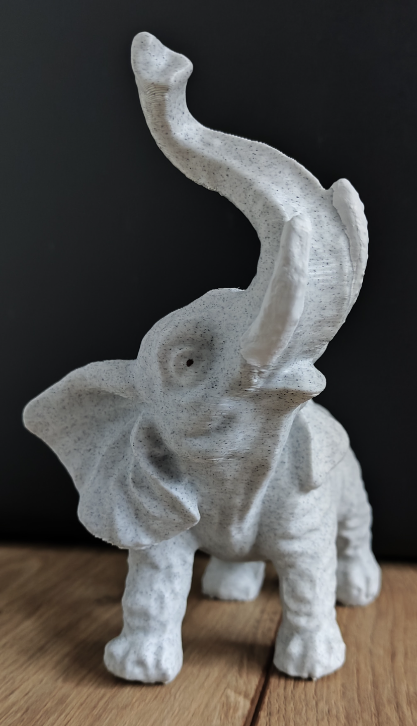 Standing elephant sculpture statue
