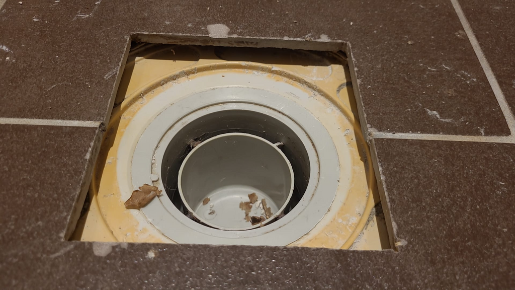 Drainage grate holder replacement