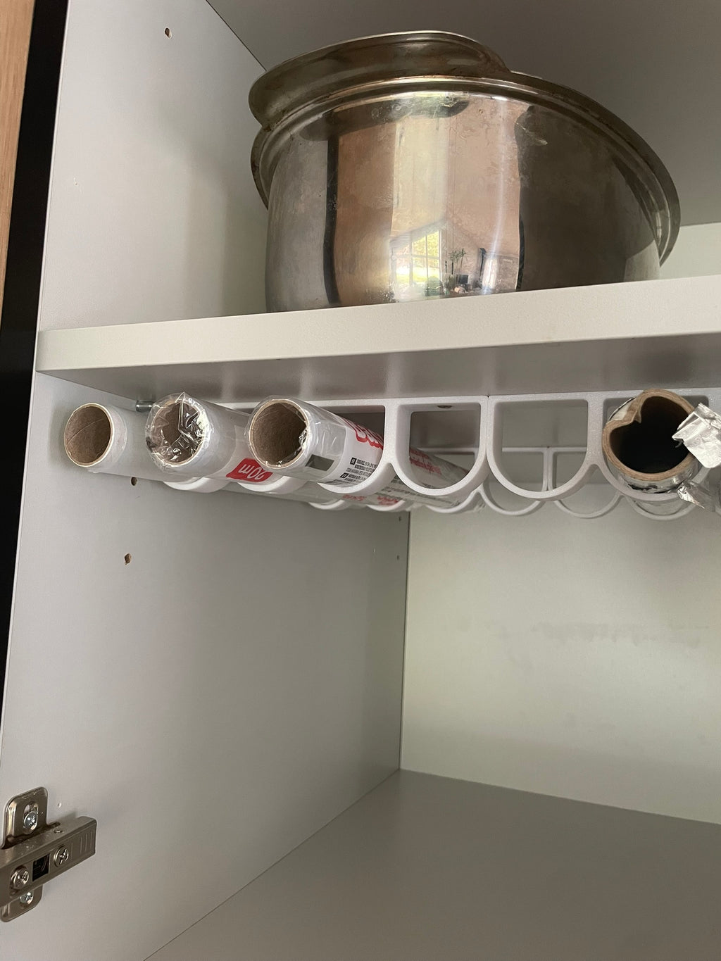 Rolls of kitchen foil and film organizer