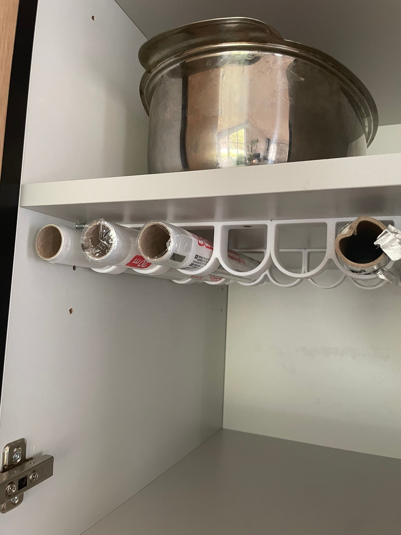 Rolls of kitchen foil and film organizer