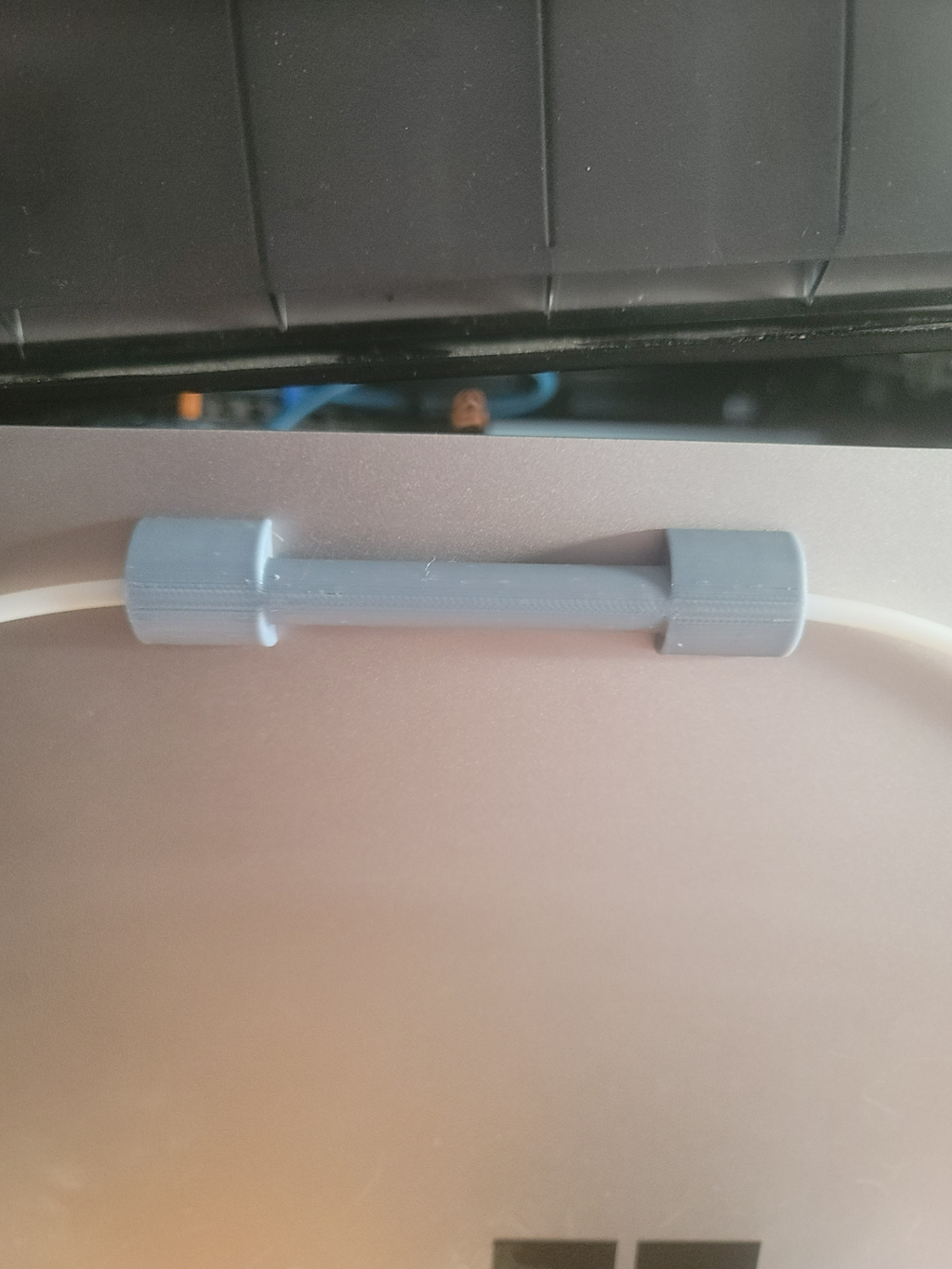 Ptfe holder for external spool