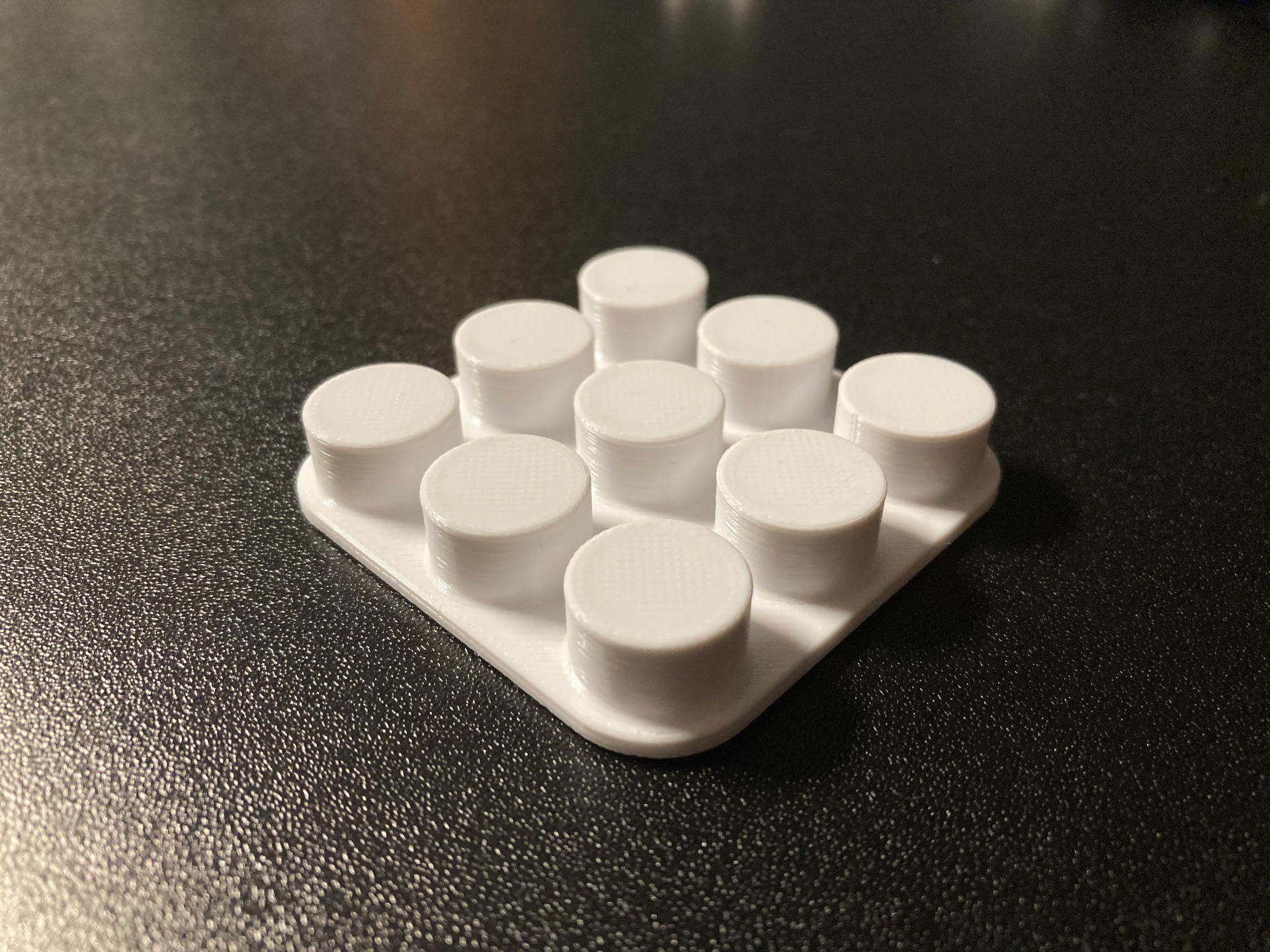 Brick like cable holder