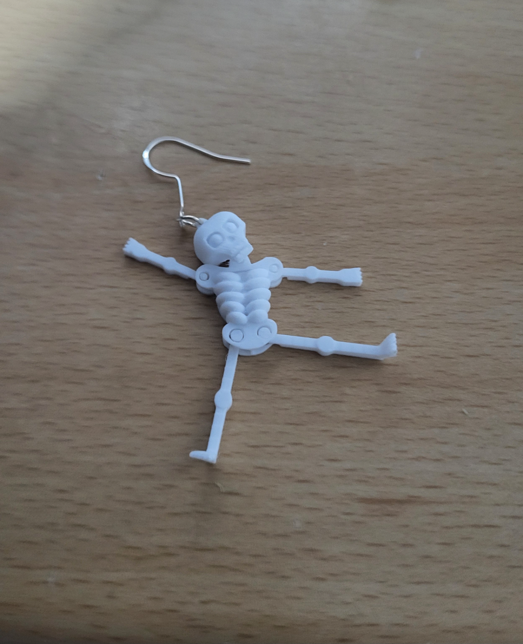 skeleton earring articulated