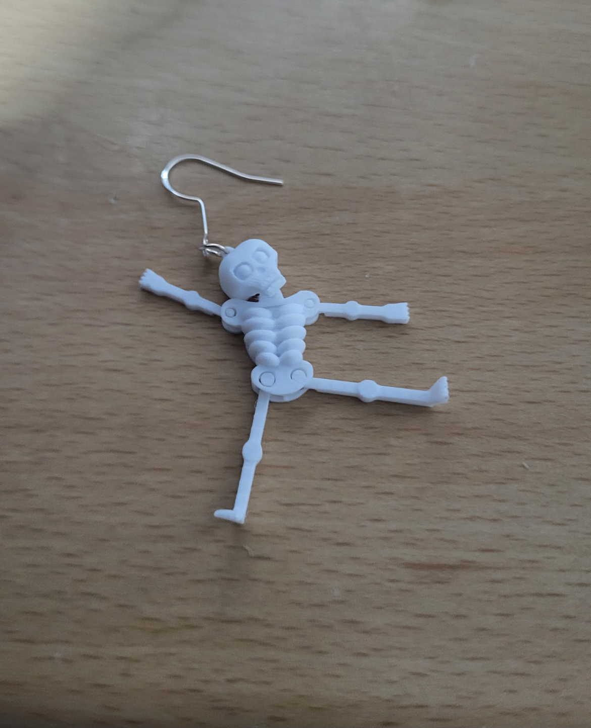 skeleton earring articulated