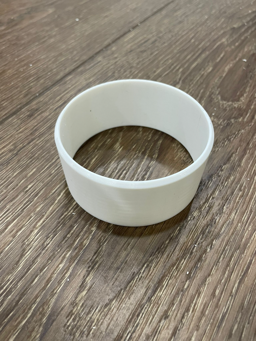 Adapter to connect 3" fitting to 2 inch fitting.
